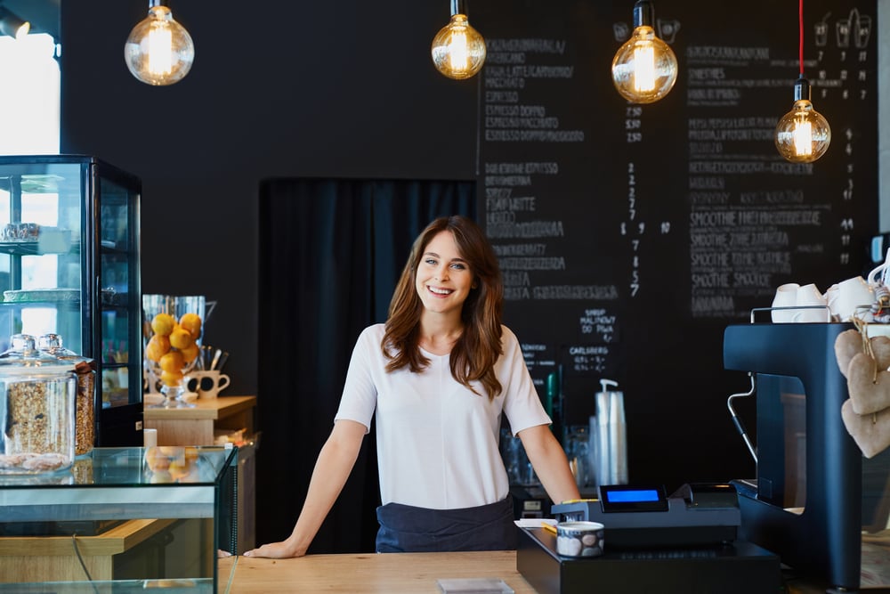 cafe owner using heartland payment systems